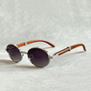 Lund™ | Vintage ovale solbriller med trestrukturert acetatramme