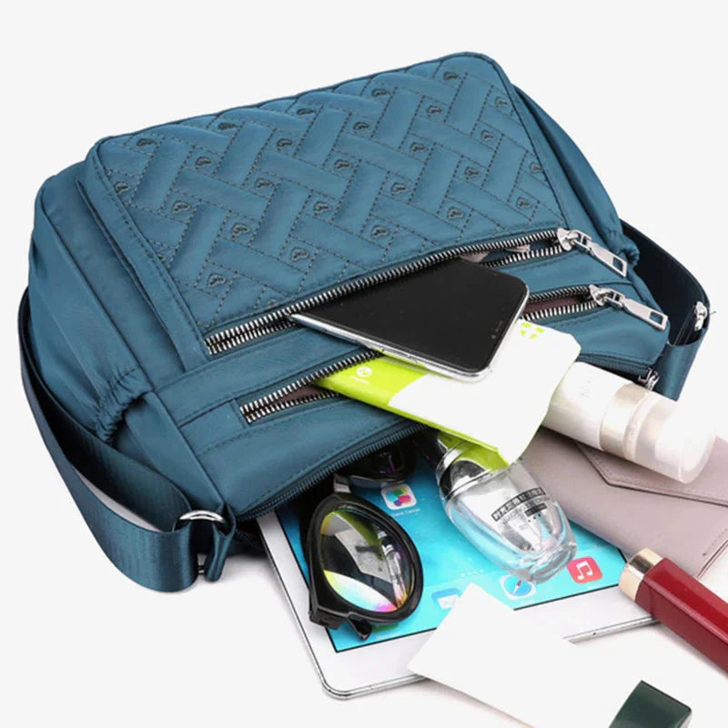 Aranya™ | Nylon skulderveske med budbringer