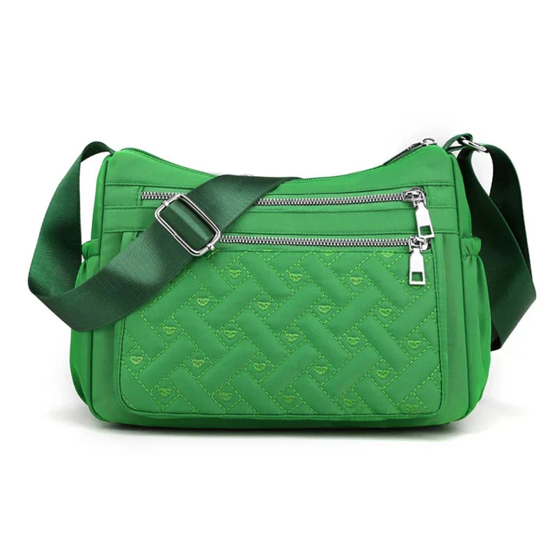 Aranya™ | Nylon skulderveske med budbringer