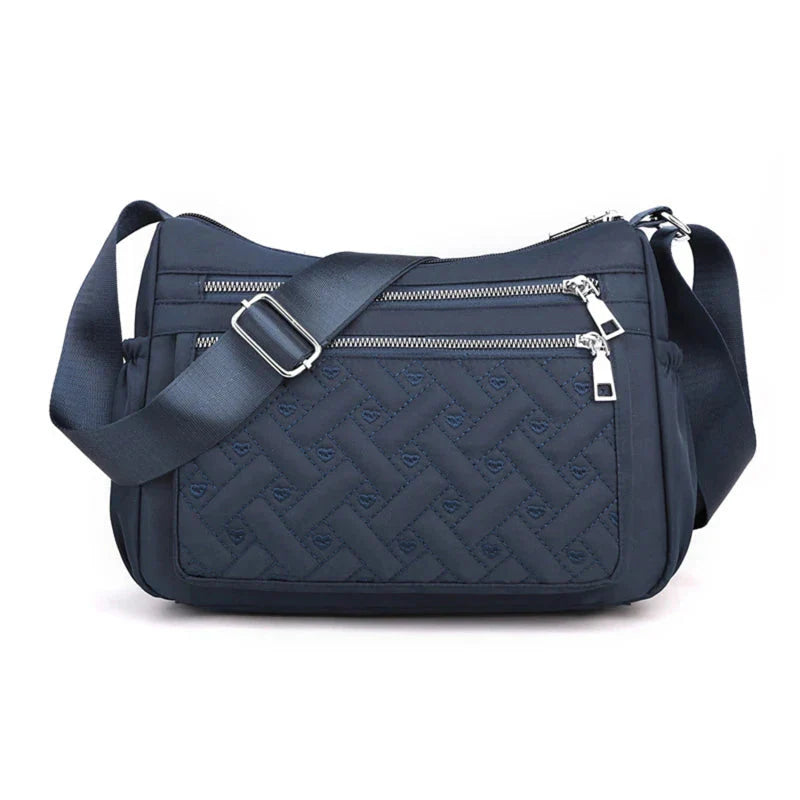 Aranya™ | Nylon skulderveske med budbringer